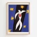 A framed art print featuring a stylized white human figure with a red chest shape, set against diagonal blue and black panels with yellow starburst motifs, hung on a light wall.